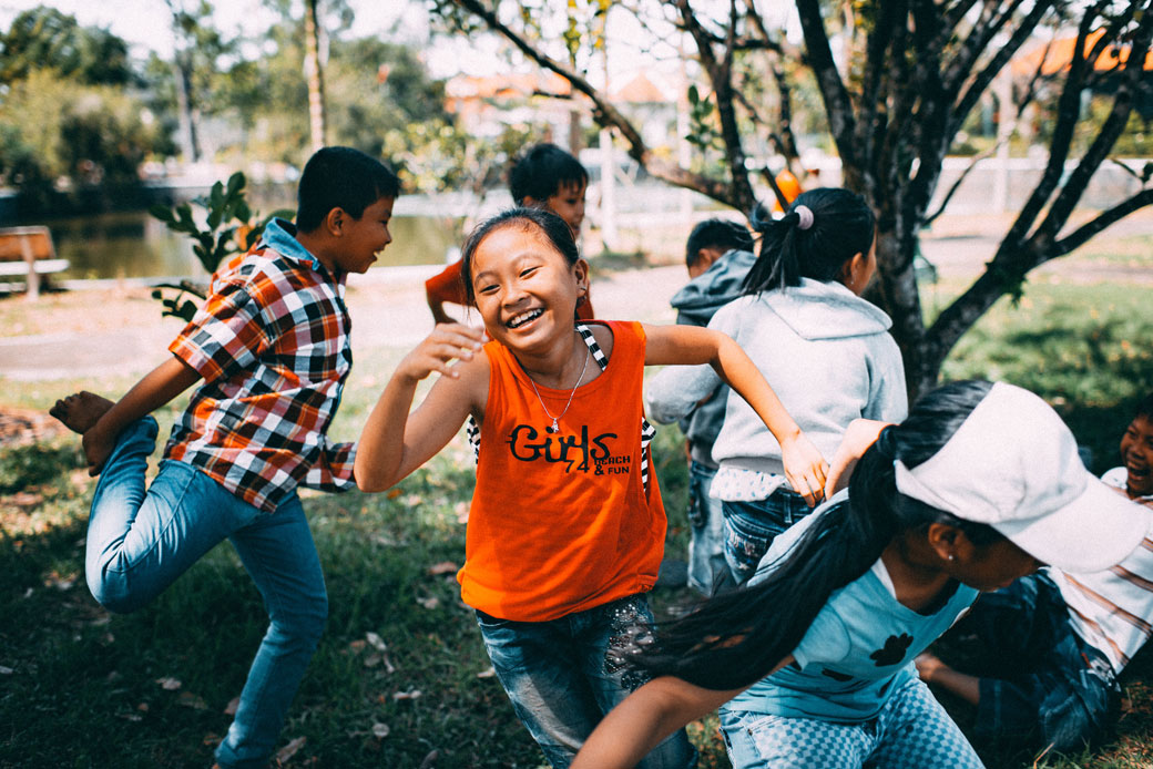 Group of children playing outdoors.